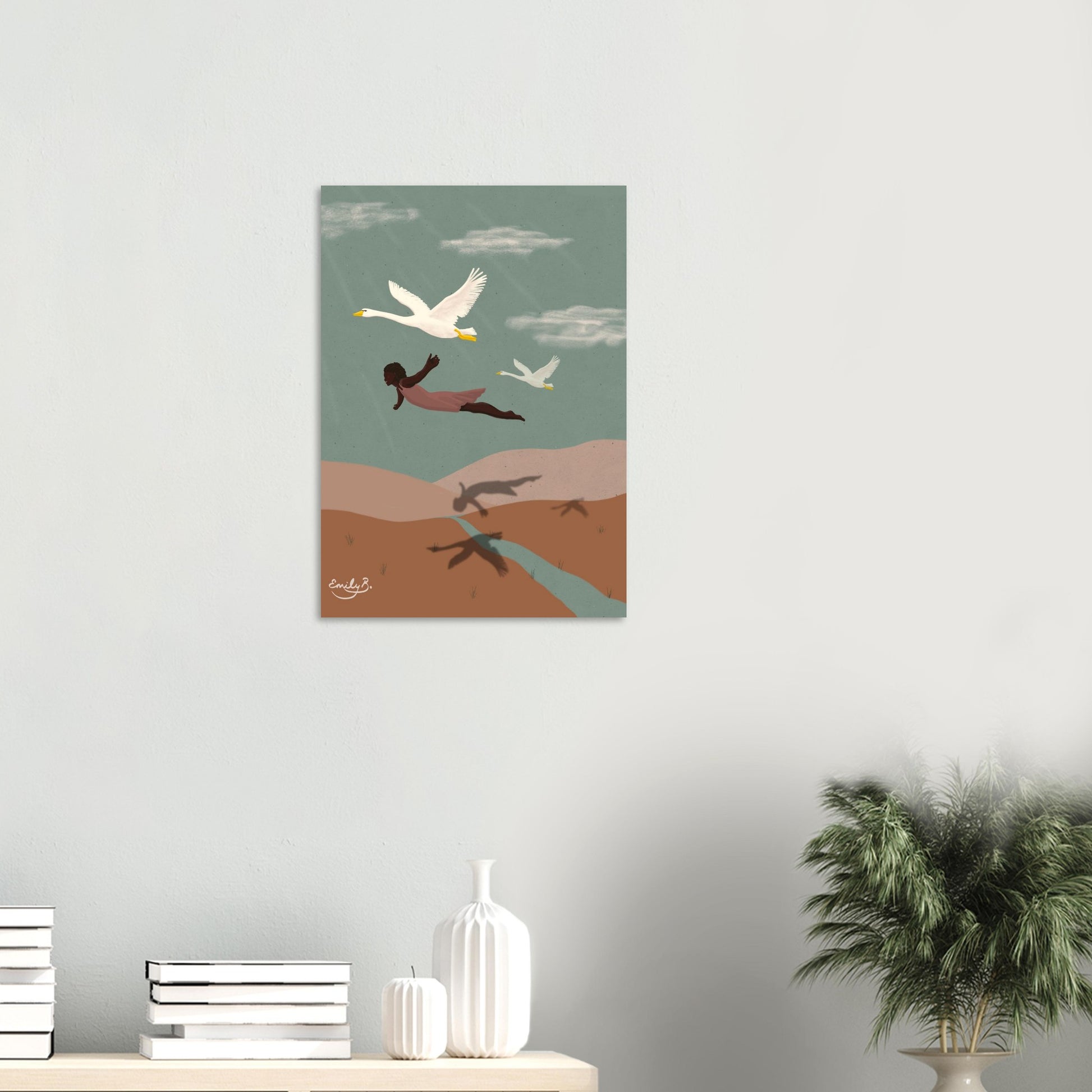 Flying With Swans art print in an interior setting, illustrating a Black woman gliding across a symbolic landscape with swans and flowing river
