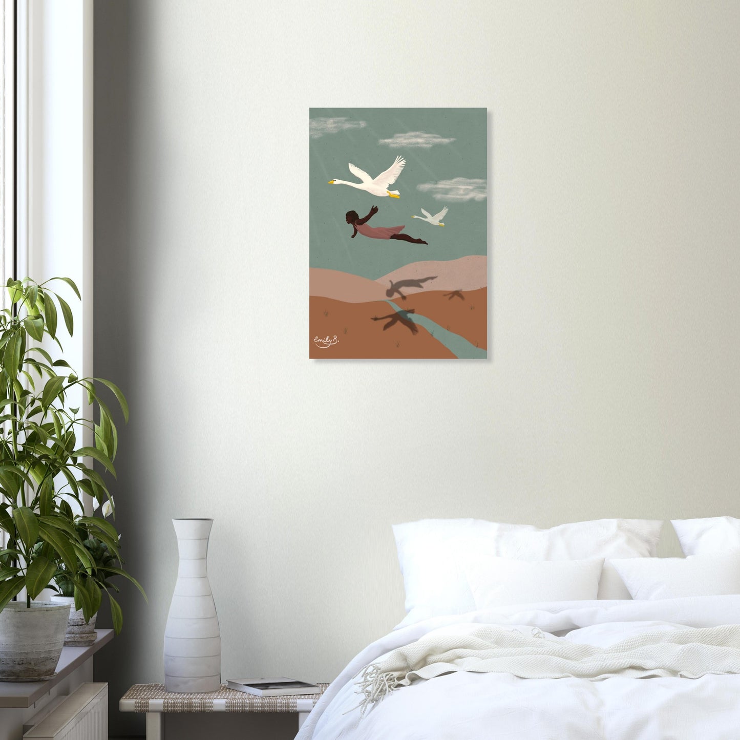 Framed wall mockup of Flying With Swans illustration featuring a Black female figure flying with swans over stylised hills and a winding river