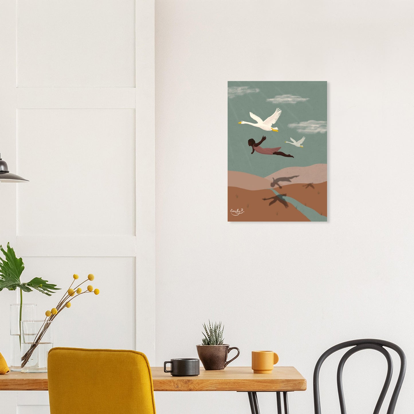 Flying With Swans wall art shown in a calm living space, depicting a Black woman soaring with swans across pale green sky and layered landscape